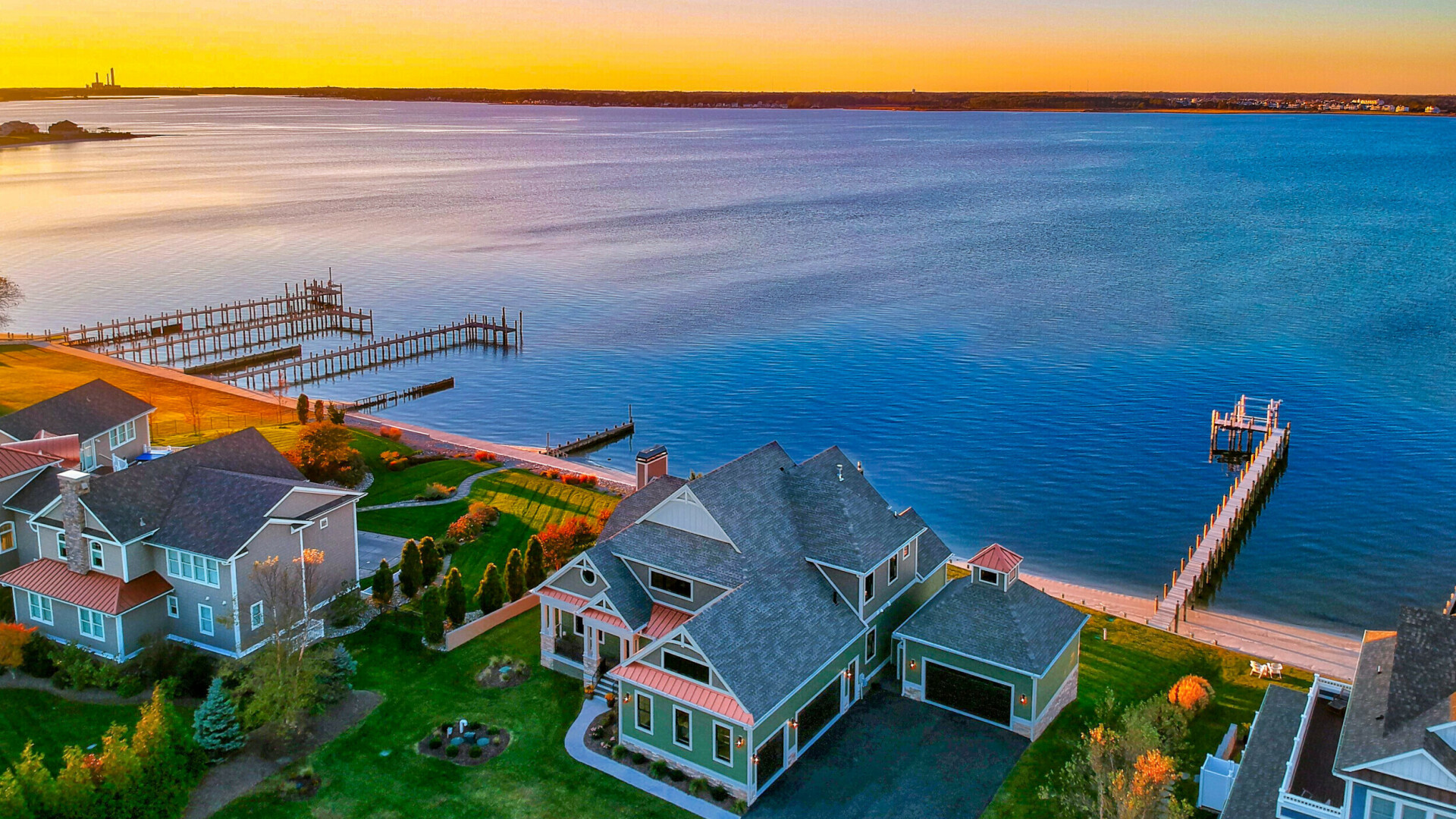 Aerial view of luxury waterfront homes at sunset, Rehoboth Beach DE