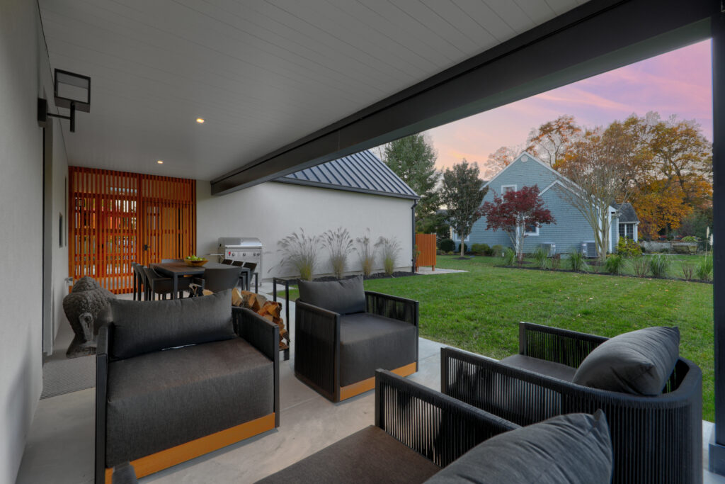 Custom home at twilight on the Delaware coast by CRx Construction