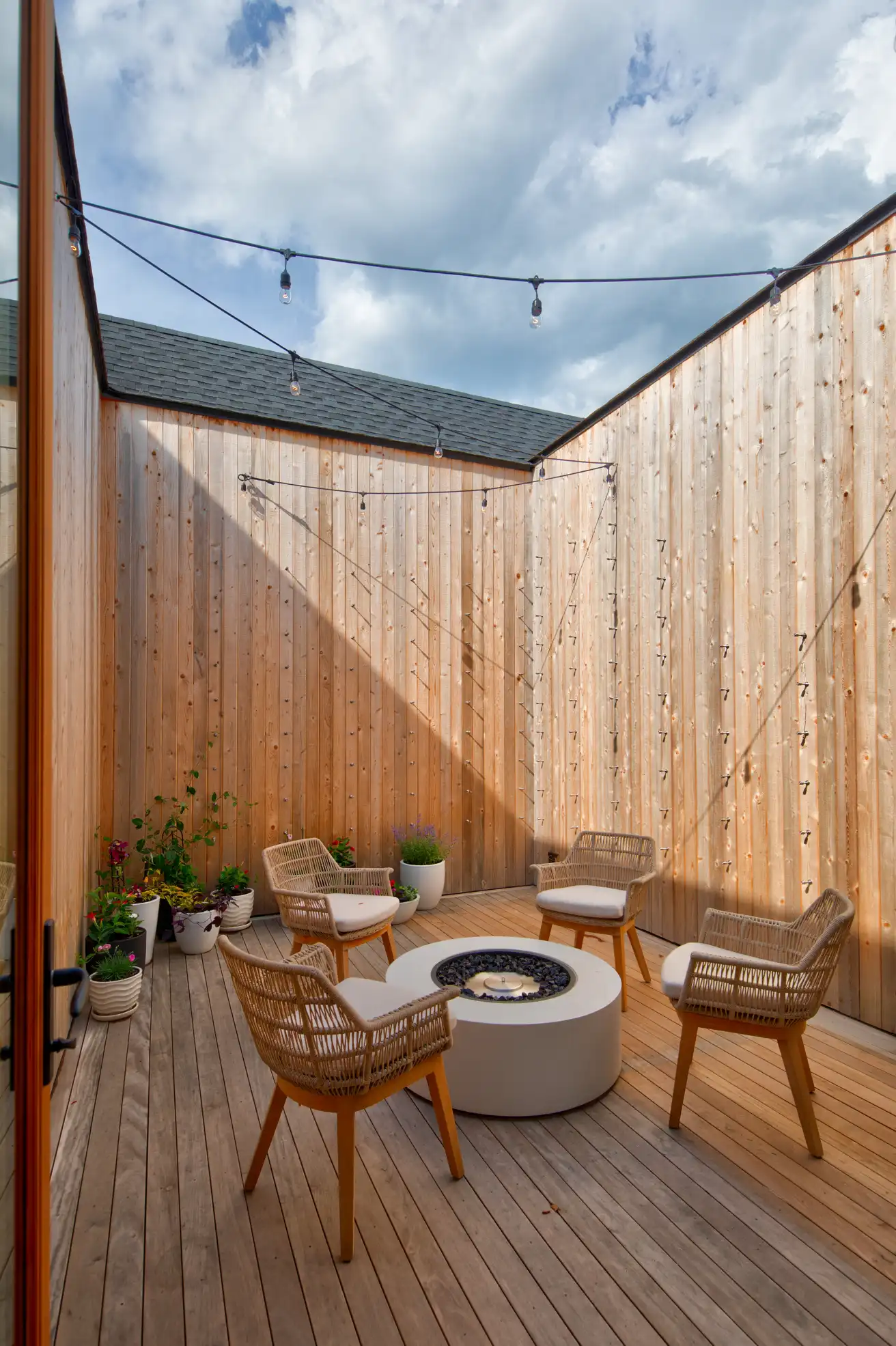 Covered deck and outdoor living at a Bay Pines coastal home