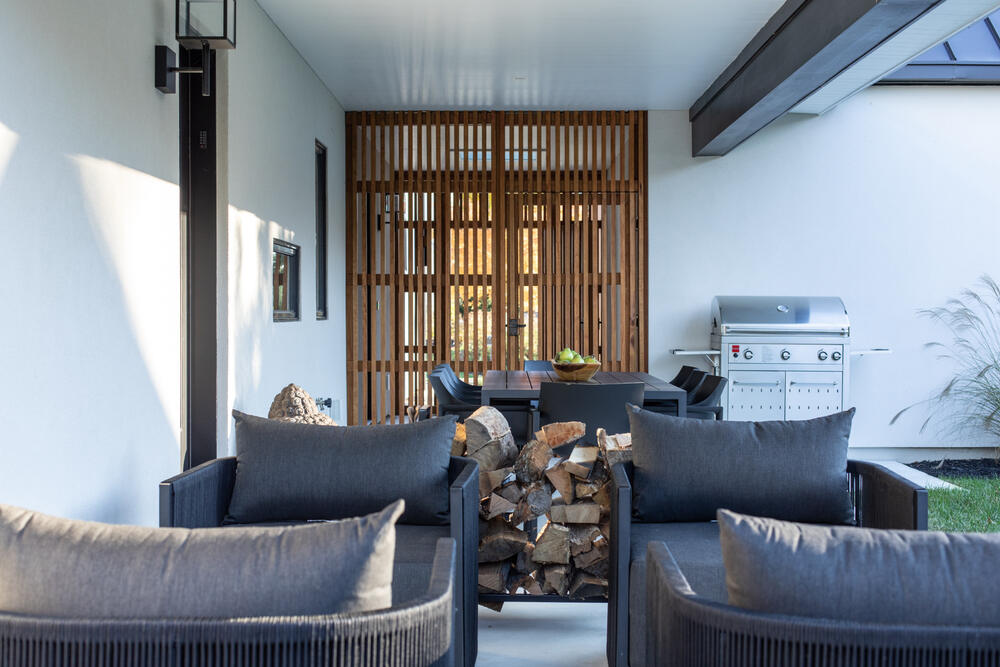 Elevated screened deck at a Salt Pond coastal home