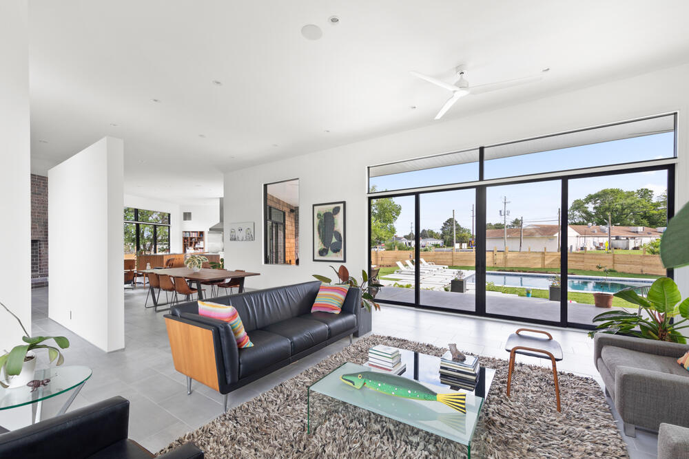 Elevated screened deck at a Breakwater coastal home