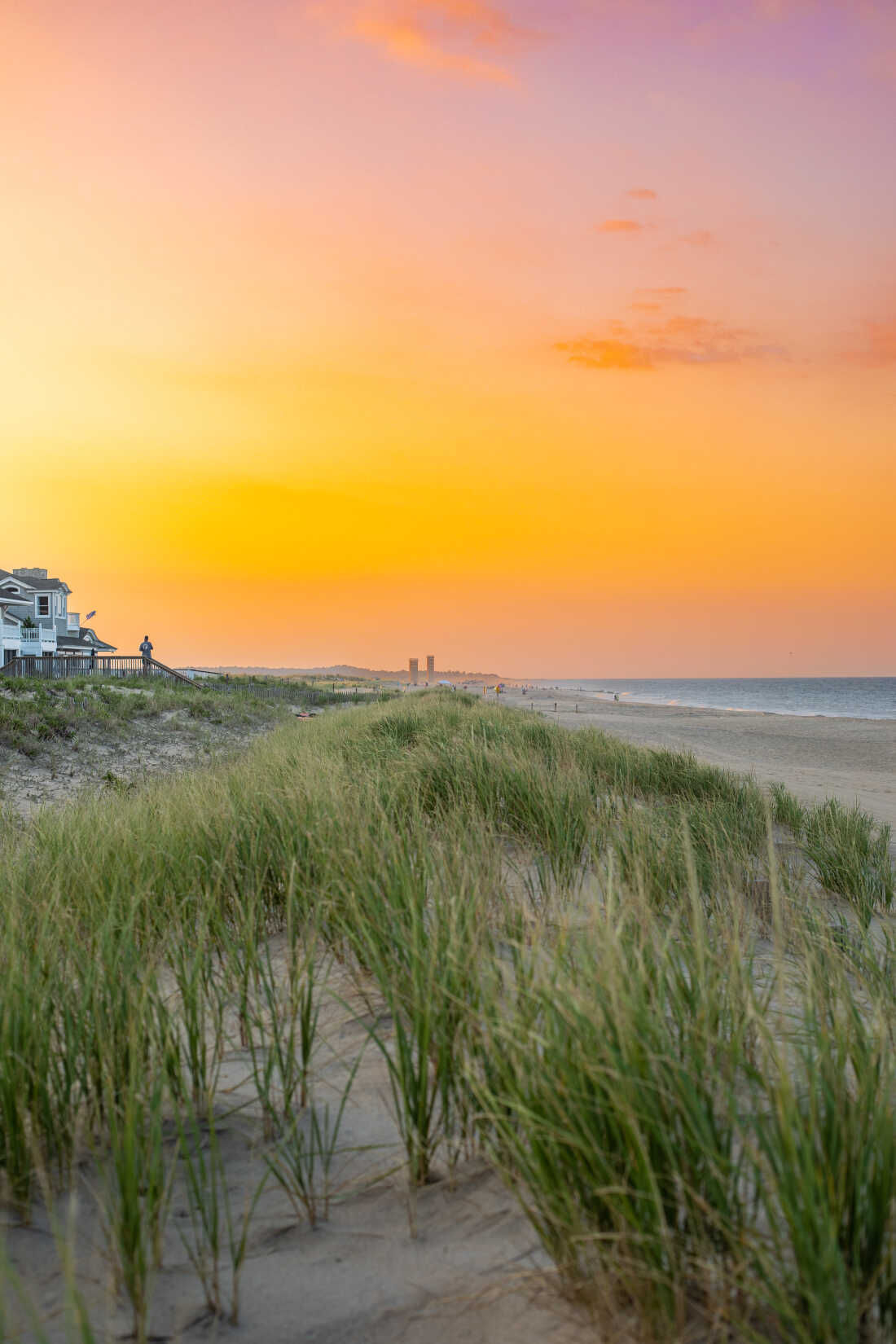 Open living and dining room with water views in a Rehoboth by the Sea custom home