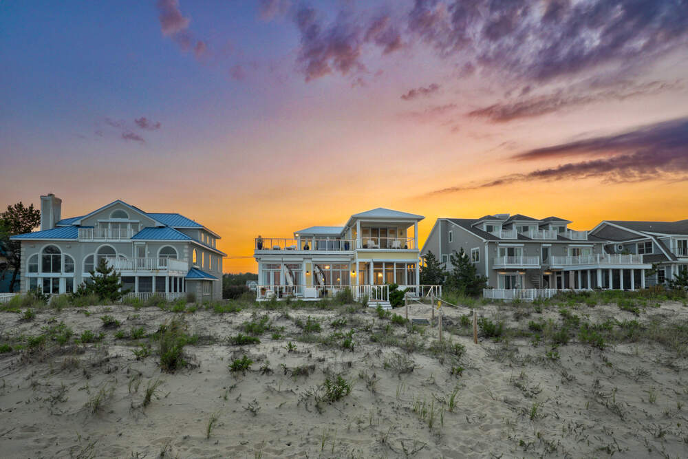 Elevated screened deck at a Rehoboth by the Sea coastal home