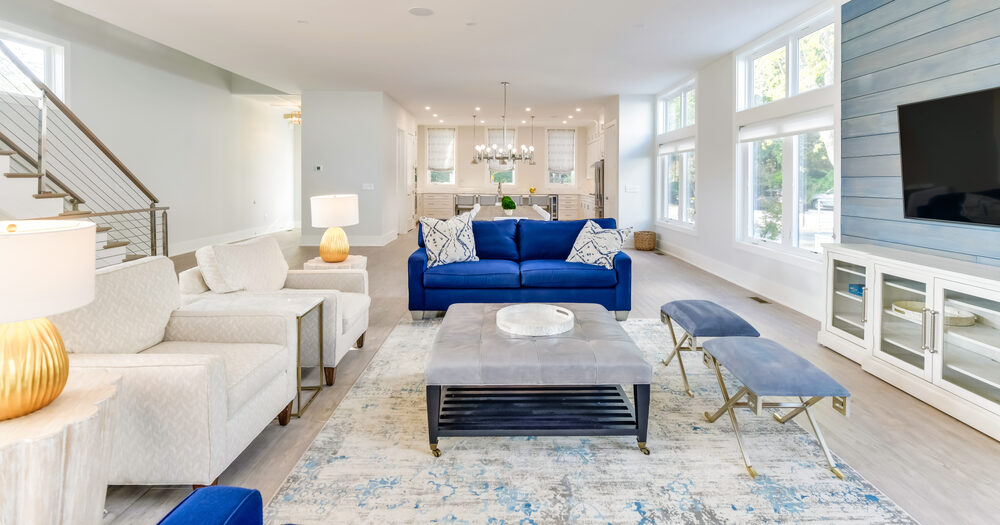 Deck lounge and outdoor living space at a Seabreeze custom home
