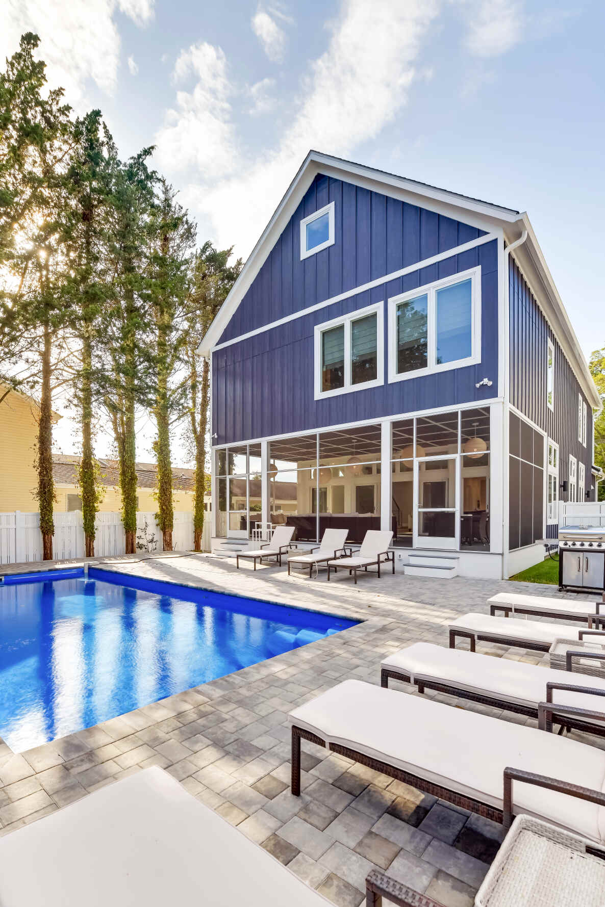 Covered deck and outdoor living at a Seabreeze coastal home
