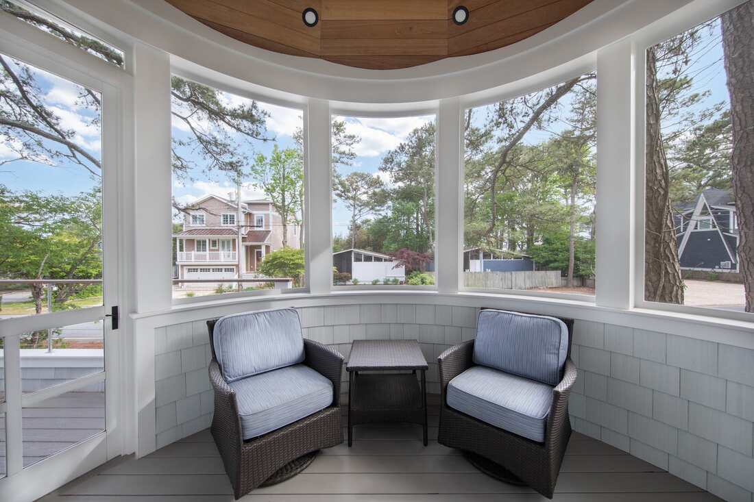 Covered deck and outdoor living at a Dewey Beach coastal home