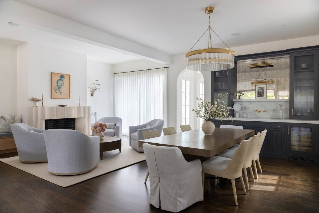 Open living and dining room with water views in a Dewey Beach custom home
