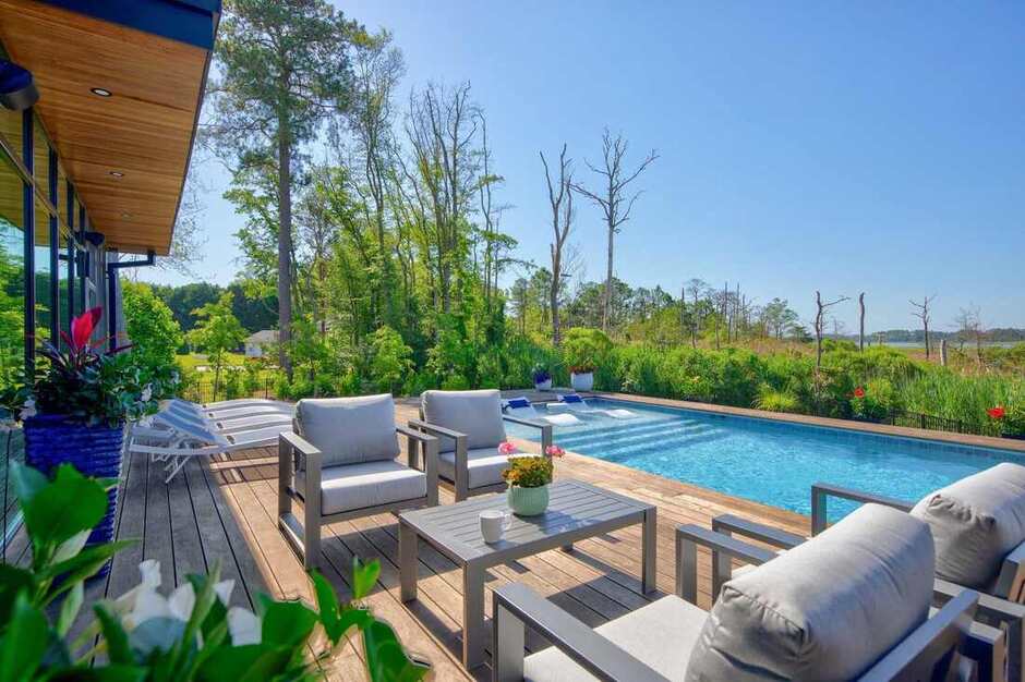 Backyard pool and lot layout at a Lewes custom home