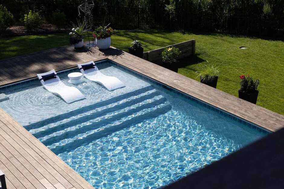 Elevated pool overlooking the Salt Pond at a Lewes custom home