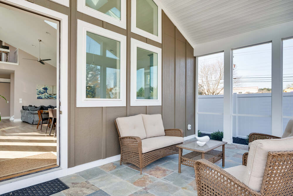 Deck lounge and outdoor living space at a North Rehoboth custom home