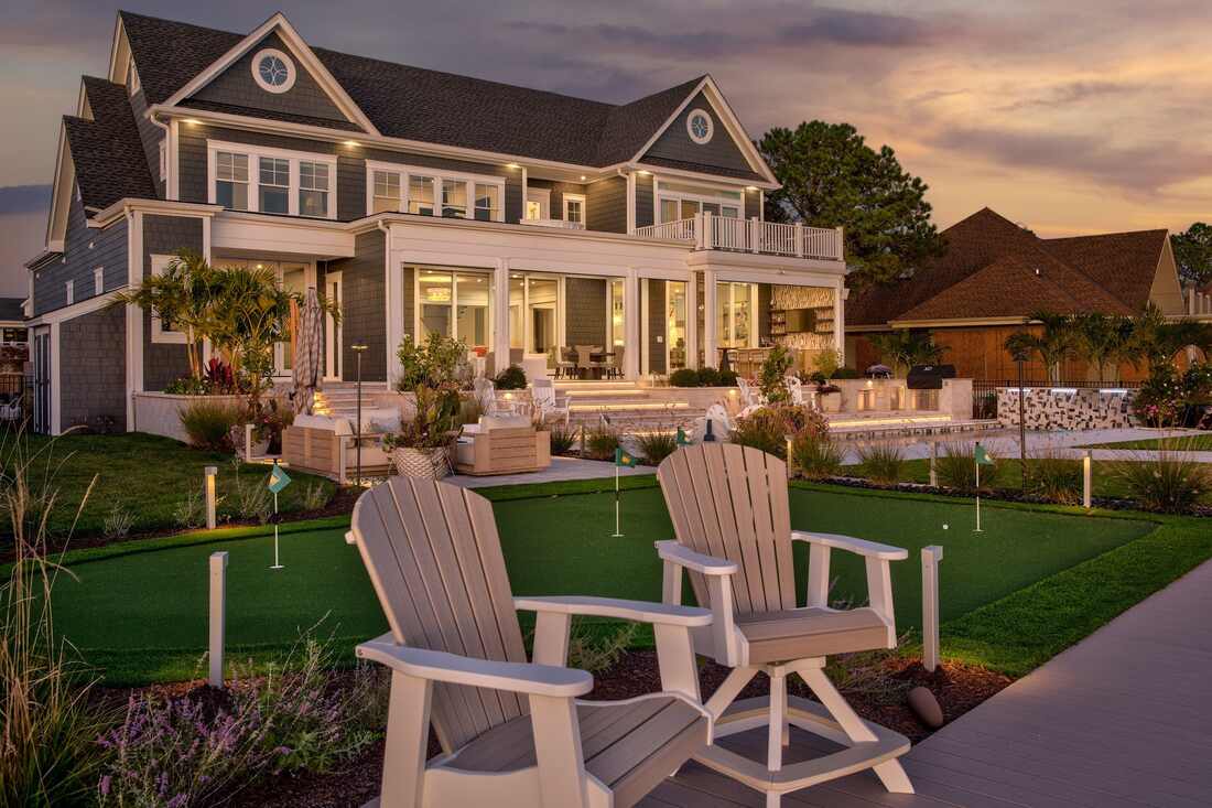 Coastal custom home exterior in North Shores showing its lot and setting