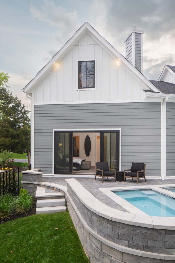Covered deck and outdoor living at a Rehoboth Beach Yacht & Country Club coastal home