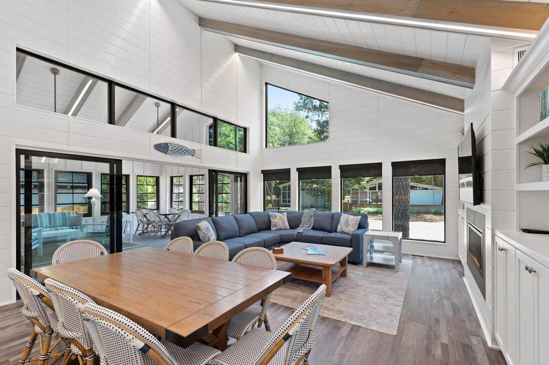Screened cedar porch at a Rehoboth Beach coastal home near the water