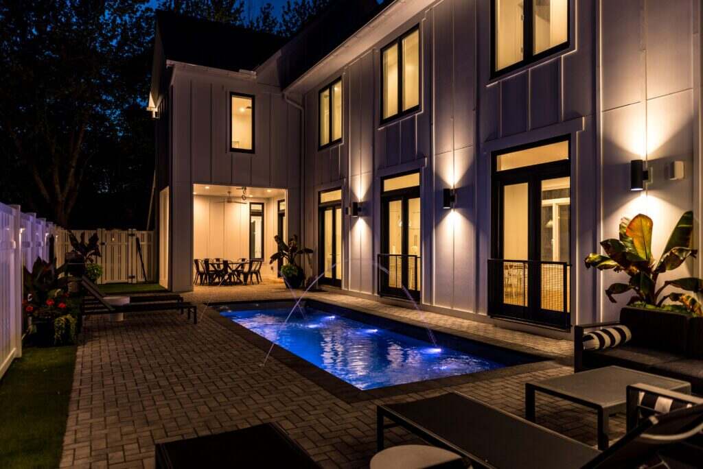 Elevated pool overlooking the Salt Pond at a Sussex Shores custom home