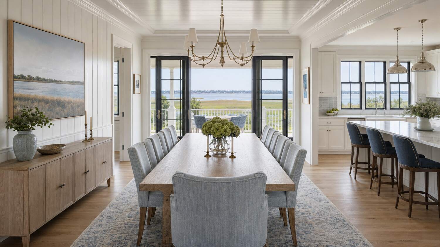 Open living and dining room with water views in a Bay Pines custom home