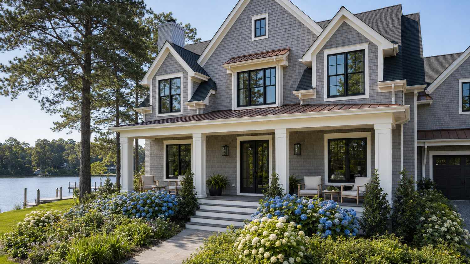 Coastal custom home exterior in Canal Corkran showing its lot and setting