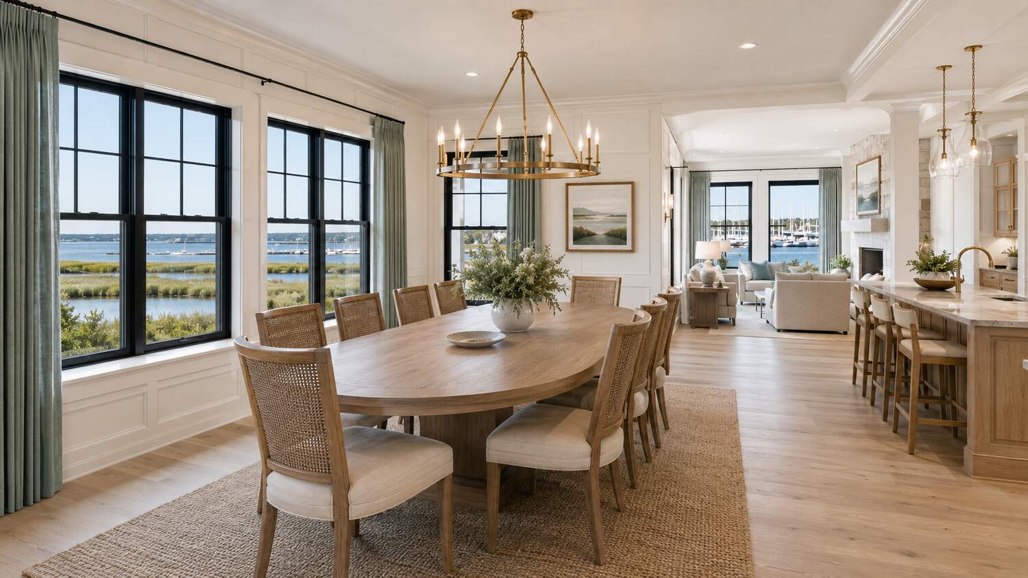Open living and dining room with water views in a South Shore custom home